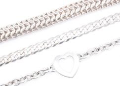 GROUP OF THREE SILVER BRACELETS
