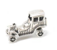 SILVER ARTICULATED CAR FIGURE