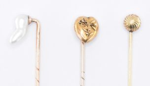 THREE VICTORIAN GOLD STICK PINS INCLUDING BAROQUE PEARL
