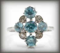 PLATINUM & BLUE ZIRCON AND DIAMOND RING