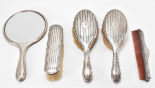 HALLMARKED SILVER DRESSING TABLE SET.