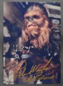 STAR WARS - PETER MAYHEW (1944-2019) - SIGNED 5X7