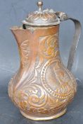 AN UNUSUAL 19TH CENTURY COPPER SPARROW BEAK JUG