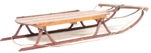ANTIQUE AMERICAN THE FLYER WOODEN AND METAL SLEIGH