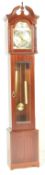 MAHOGANY CASED TEMPUS FUGIT CASED GRANDDAUGHTER CLOCK