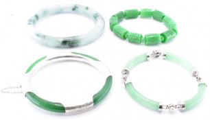 FOUR CHINESE JADE BRACELETS