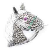 SILVER STONE SET HORSE BROOCH