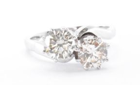 18CT WHITE GOLD & DIAMOND CROSSOVER RING