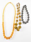 COLLECTION OF EARLY PLASTIC & BAKELLITE NECKLACES