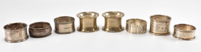 HARLEQUIN SET OF EIGHT SILVER HALLMARKED NAPKIN RINGS