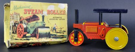 VINTAGE BRITISH MADE TINPLATE CLOCKWORK STEAM ROLLER