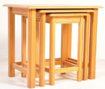 20TH CENTURY CHUNKY OAK FURNITURE LAND NEST OF TABLES