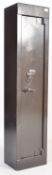 A contemporary  / late 20th century gun cabinet. The upright locker of steel construction having