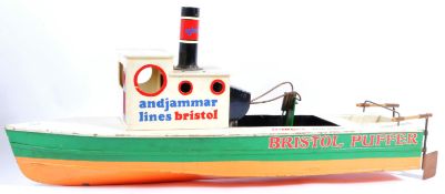 MID CENTURY SCRATCH BUILT MODEL BOAT HOUSING A MAMOD ENGINE