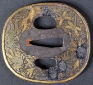 EARLY 19TH CENTURY JAPANESE IRON TSUBA WITH DAMASCENE DETAILING