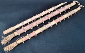 THREE 20TH CENTURY OCEANIC TEBUTJE SHARK TOOTH WEAPONS