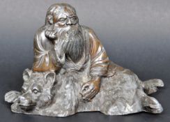 19TH CENTURY BRONZE BEAR AND HUNTER GROUP