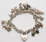 VINTAGE SILVER HALLMARKED CHARM BRACELET