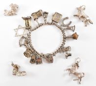 VINTAGE SILVER HALLMARKED CHARM BRACELET