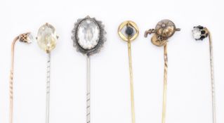 GROUP OF VICTORIAN STICK PINS INCLUDING JOCKEY HAT & WHITE STONE