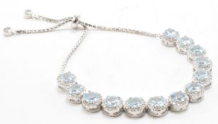 SILVER TOPAZ &CZ LINE BRACELET