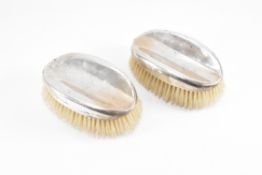 PAIR OF EDWARDIAN SILVER HALLMARKED CLOTHES BRUSHES