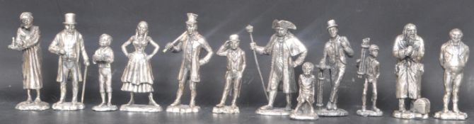 COLLECTION OF WHITE METAL DICKENS FIGURES