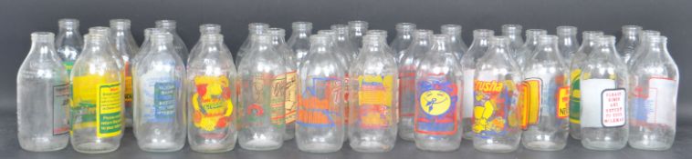 COLLECTION OF VINTAGE MILK GLASS ADVERTISING BOTTLES