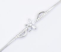 9CT WHITE GOLD FLOWER CLUSTER BRACELET