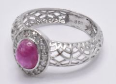 18CT WHITE GOLD CABOCHON BURMA RUBY & DIAMOND HALO RING