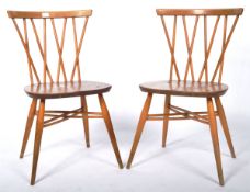ERCOL - PAIR OF CANDLESTICK MODEL 376 BEECH AND ELM CHAIRS