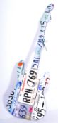 CONTEMPORARY AMERICAN NUMBER PLATE COVERED GUITAR ART