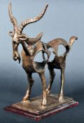 CONTEMPORARY BRONZE WORKED SCULPTURE OF AN ANTELOPE
