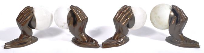 MATCHING SET OF FOUR ART DECO STYLE HAND & GLOBE WALL LIGHTS