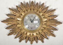 ART DECO STARBURST GILT FRAME WALL CLOCK