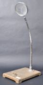 VINTAGE MAGNIFYING GLASS ON STAND - PHILLIP HARRIS & CO