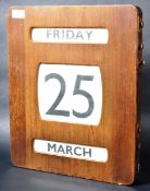 OAK CASED WALL MOUNTED PERPETUAL CALENDAR