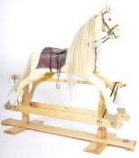 CONTEMPORARY CARVED ROCKING PALOMINO HORSE - 'XANTHOS'