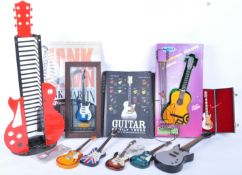 COLLECTION OF VINTAGE 20TH CENTURY GUITAR RELATED CURIOS