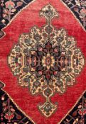 AN EARLY 20TH CENTURY HAND KNOTTED PERSIAN BAKHTIAR RUG