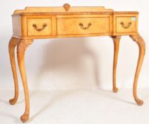 A VINTAGE QUEEN ANNE REVIVAL BURR WALNUT DESK