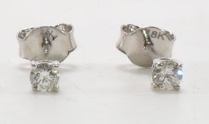 PAIR OF HALLMARKED 18CT GOLD & DIAMOND STUD EARRIN