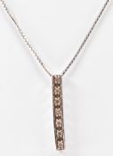 18CT WHITE GOLD AND DIAMOND PENDANT NECKLACE