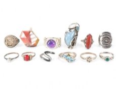 TWELVE ASSORTED SILVER RINGS