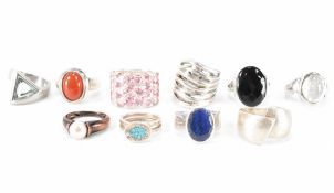 TEN SILVER STONE SET RINGS