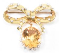 GOLD DIAMOND & TOPAZ BOW BROOCH
