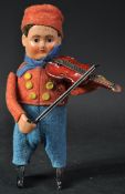 VINTAGE GERMAN SCHUCO TINPLATE CLOCKWORK VIOLIN BOY