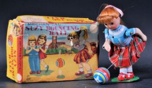 VINTAGE JAPANESE TINPLATE CLOCKWORK ' SUZY BOUNCING BALL '