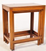 A RETRO VINTAGE MID 20TH CENTURY WALNUT NEST OF TABLES