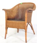 A RETRO VINTAGE MID 20TH CENTURY LLOYD LOOM TUB CHAIR